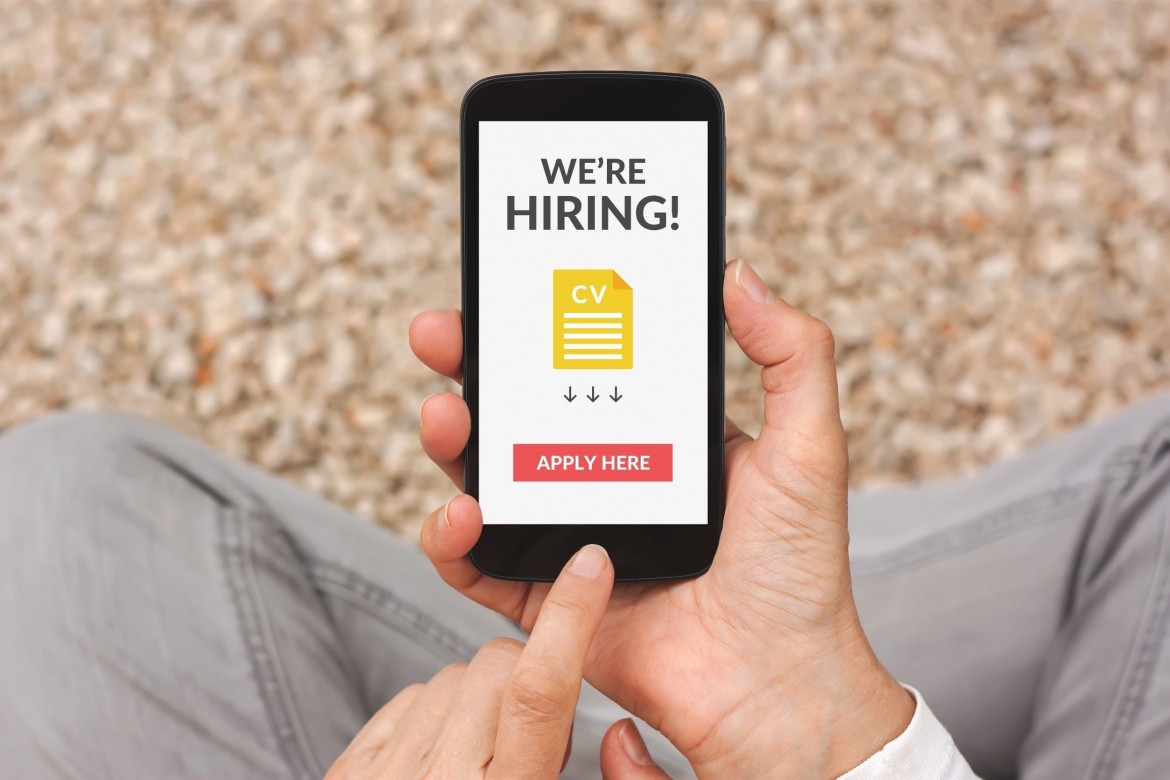 marketing for recruiters concept image where candidate gets job opportunity ad on iphone